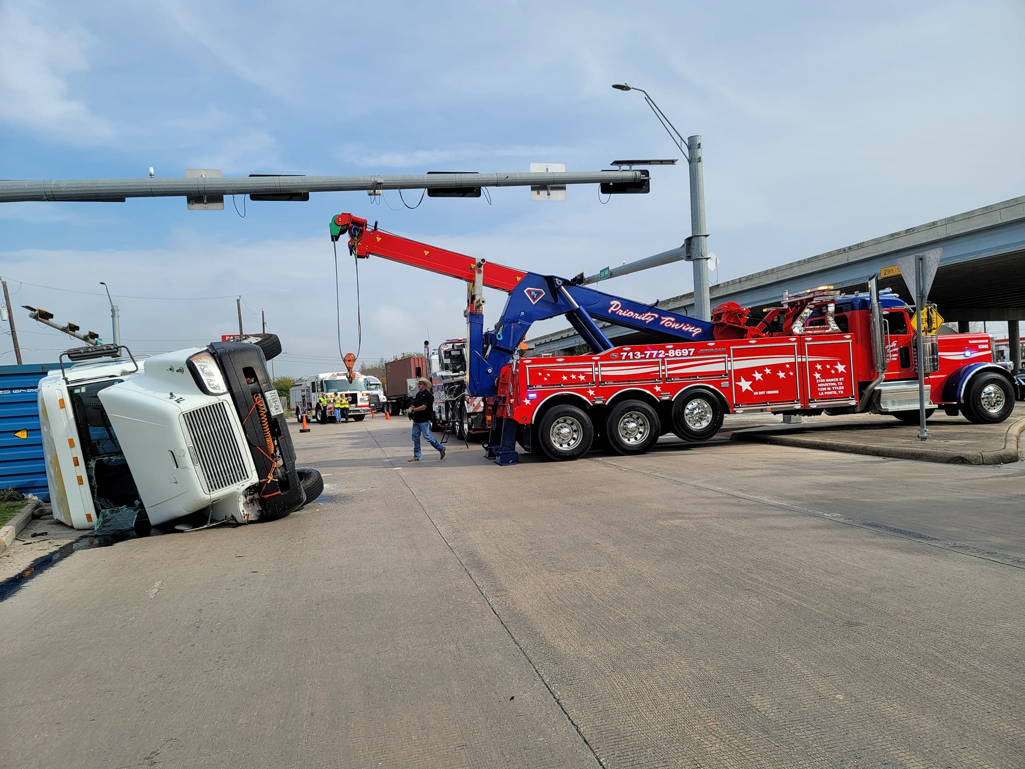 Priority Towing heavy recovery of an overturned vehicle in Houston