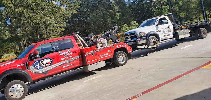 Priority Towing recovering a work truck — fleet operators